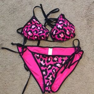 Large top medium bottom PINK leopard swim suit